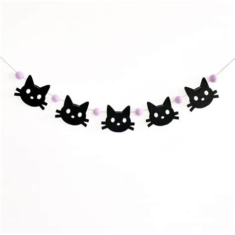 A garland made from spooky cat silhouettes