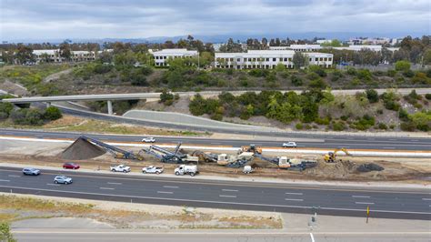 Construction work on Sr-73 highway, with reduced speed limit signs