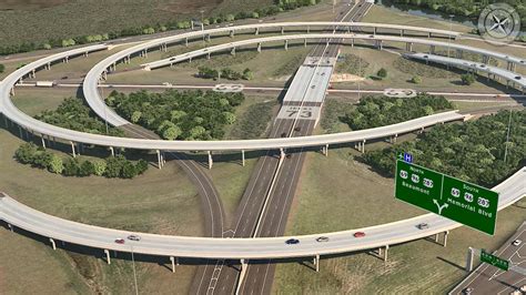 Interchange on Sr-73 highway, with multiple lanes and traffic signals