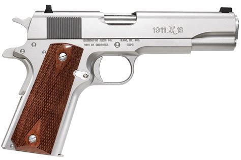 Stainless Steel 1911 45 ACP handgun on a wooden table