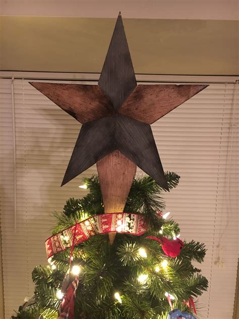 A collection of Christmas tree star toppers in different designs and colors