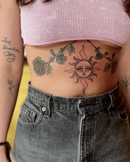 Stomach tattoo placement for women