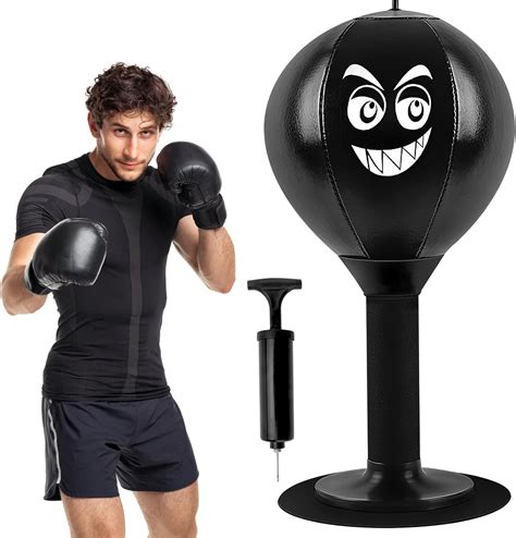 A person punching a stress bag with a fierce expression