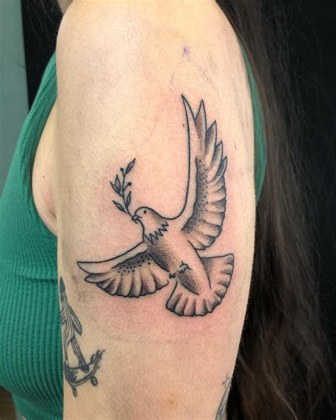 Description of Realistic Dove Tattoo 10