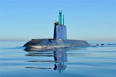 Submarine breaking through the ice