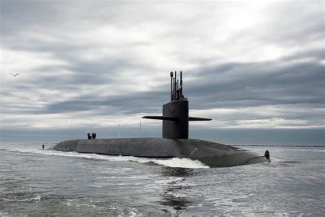 Typhoon-class submarine surfacing in the Barents Sea