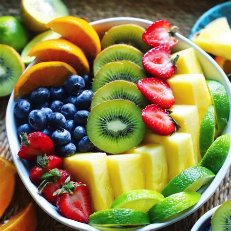 Summer fruit bowl with strawberries, blueberries, and grapes