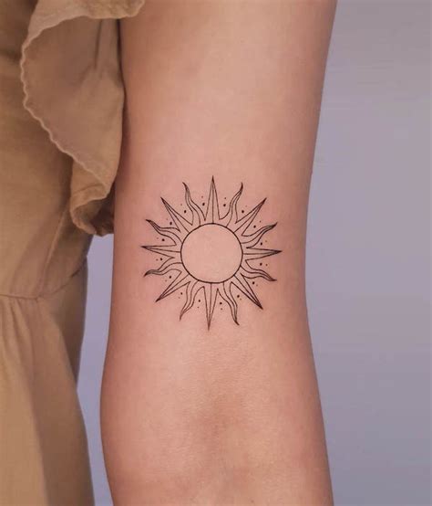 Sun Symbol Tattoo