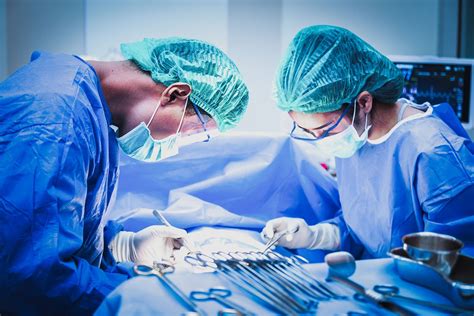 Surgical Technologist assisting during surgery