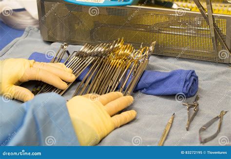 Surgical Technologist preparing instruments