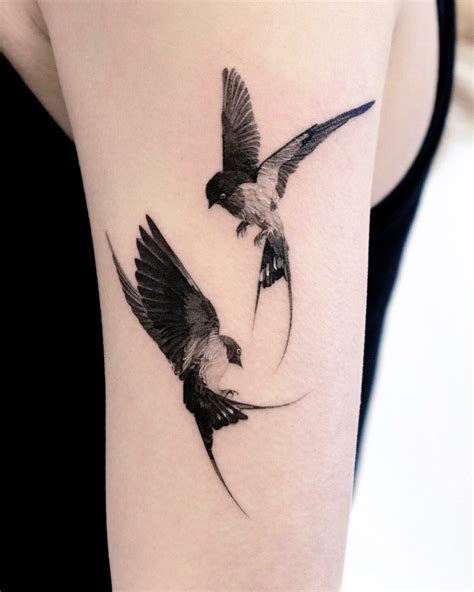 Sailor Jerry's swallow tattoos