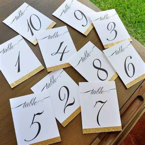 Place cards with table numbers