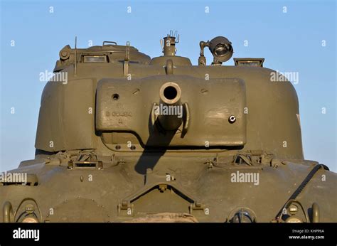 A detailed drawing of a tank's turret and gun, featuring intricate details and textures