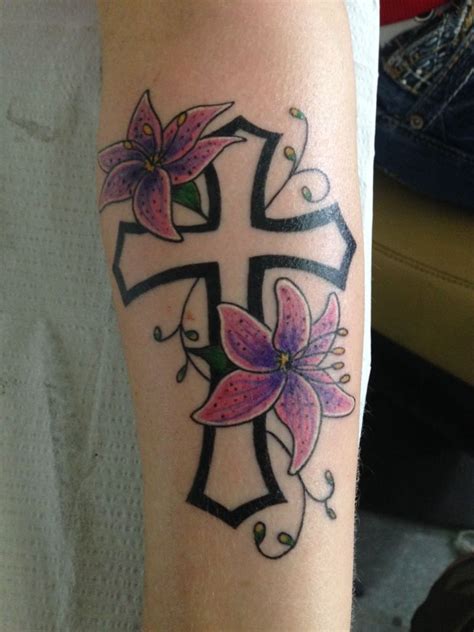 Tattoo design cross with lily