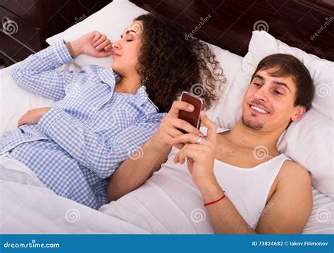 Texting in Bed Partner