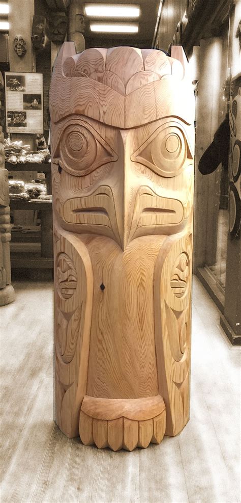 A collection of totem pole designs featuring various animals and spirits