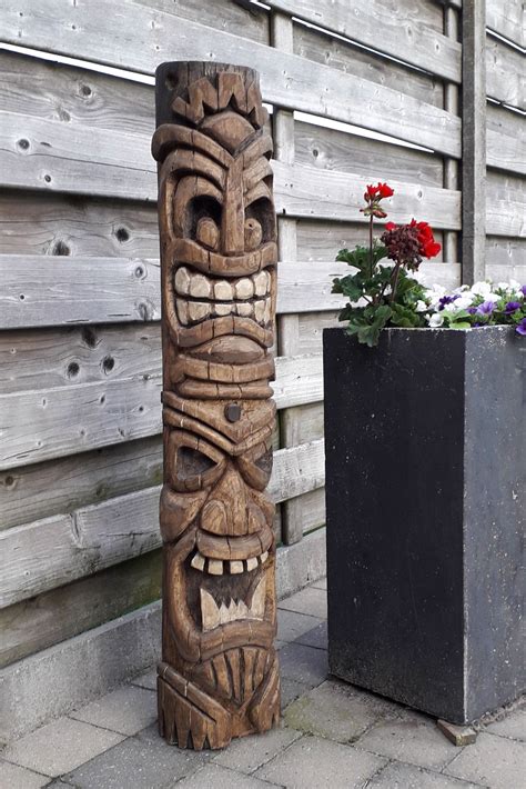 A collection of totem pole ideas featuring various animals and spirits