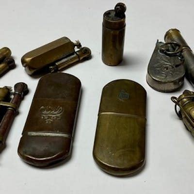 A collection of trench lighters on display at a historical society