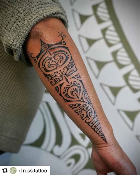 Tribal back forearm tattoo