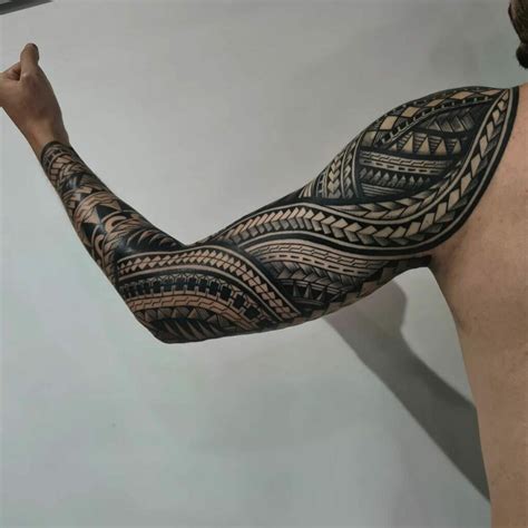 Tribal bicep tattoos