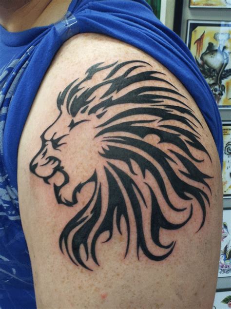 Tribal lion zodiac tattoo meaning