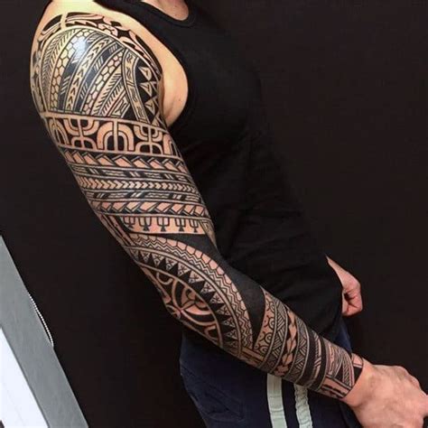 Tribal pattern arm sleeve tattoos