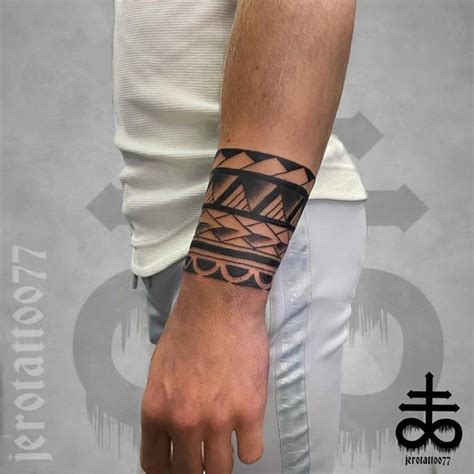 Tribal wrist tattoo