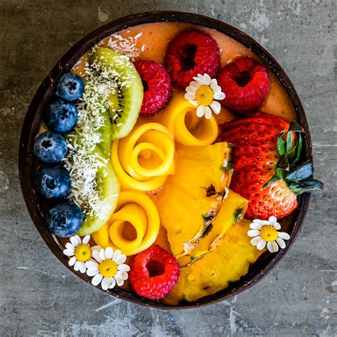 Tropical fruit bowl with pineapple, mango, and kiwi