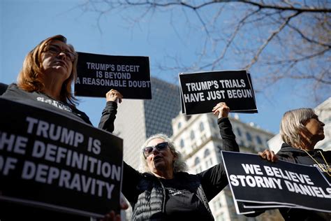 Protesters marching against the Trump presidency