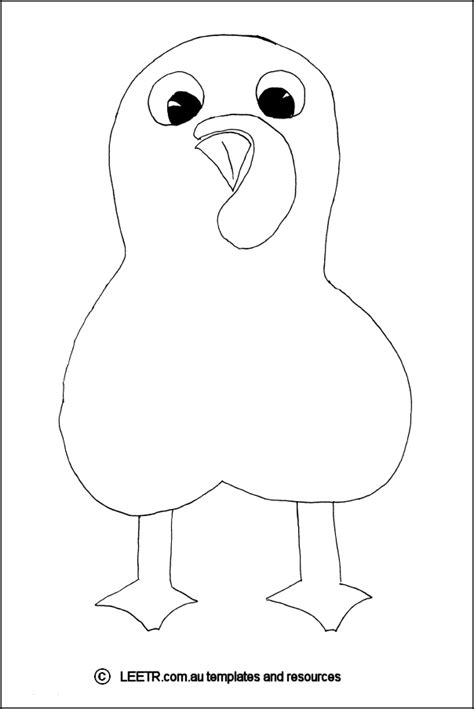 A child creating a story using a free printable turkey body template