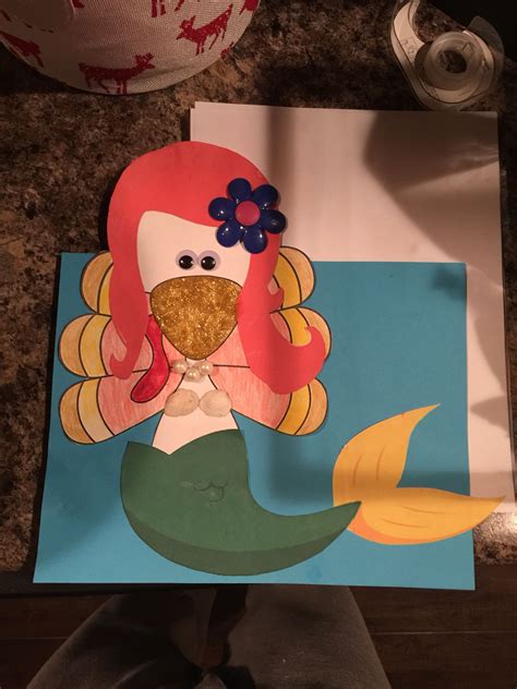 A turkey disguised as a mermaid