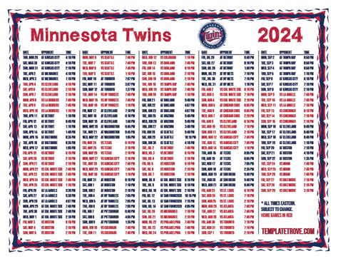 Twins fan holding a printable schedule and phone