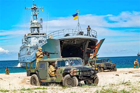 Ukrainian Navy personnel interacting with local community