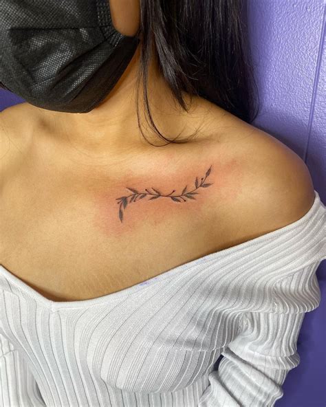 Under Collar Bone Tattoo Gallery