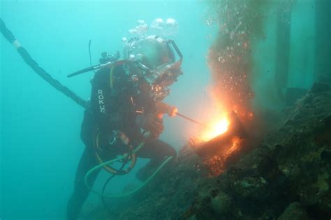 Underwater construction diving is a challenging job that requires physical fitness and ability to work in extreme weather conditions.