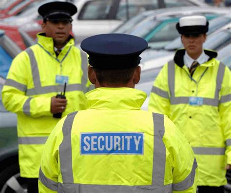 Uniformed security officers from Aegis Protective Services