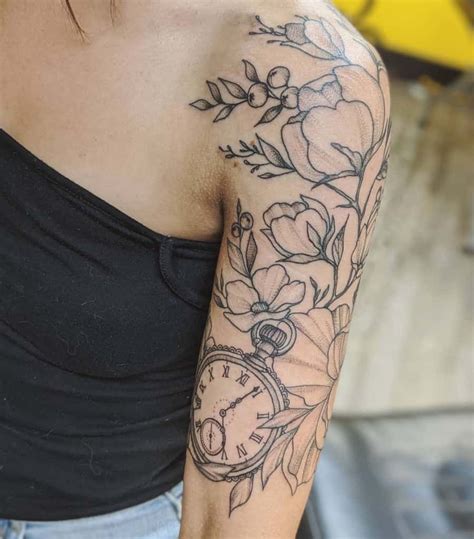 Upper arm tattoo designs for women