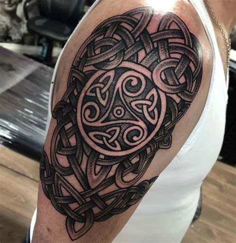 Upper arm tattoo ideas for men with Celtic heritage