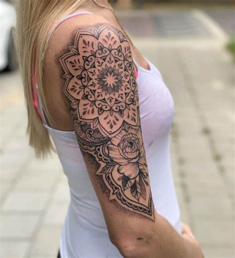 Upper arm tattoo styles and techniques