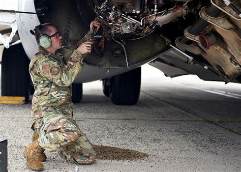 Aircraft Mechanic in the US Air Force working on an F-16 fighter jet