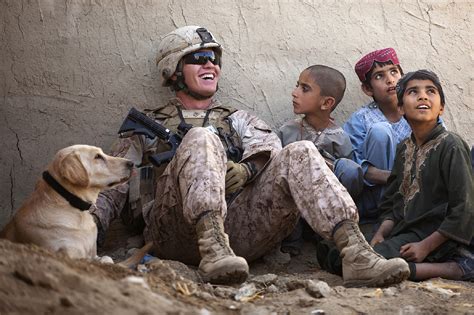 US Army soldier with children