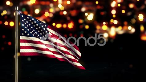 A solar-powered flag light illuminating the American flag