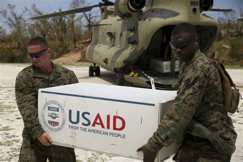 US Navy sailors providing humanitarian aid