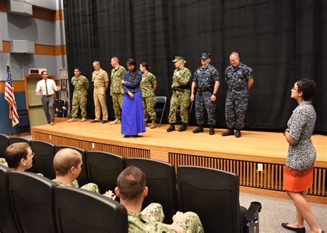 US Navy sailors engaging with local community