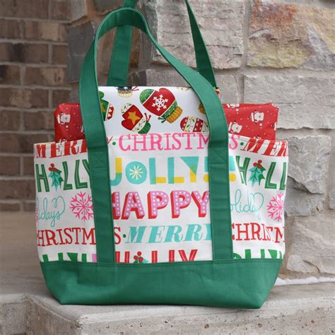 Woman holding a Christmas canvas bag with gifts inside