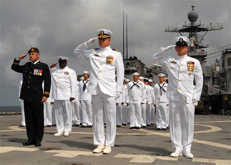 U.S. Navy sailors rendering a salute