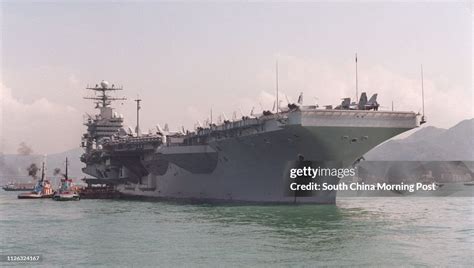 The USS Abraham Lincoln at anchor, in a foreign port