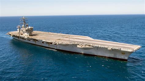 USS Nimitz crew members at work