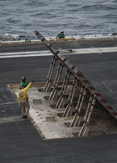 Helicopter landing on the USS Nimitz