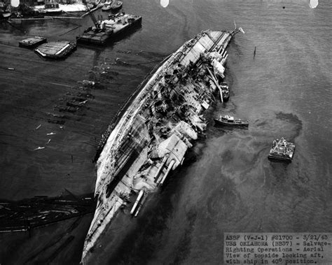 USS Oklahoma BB-37 being righted at Pearl Harbor